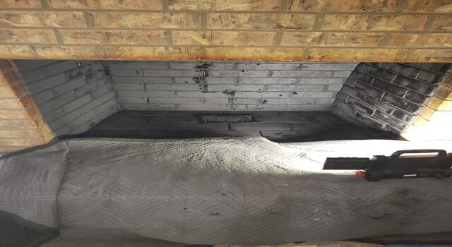 Firebox Repair In Herriman Repair being made on a firebox inside a home
